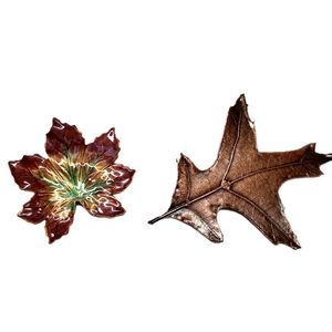 2 leaf brooches